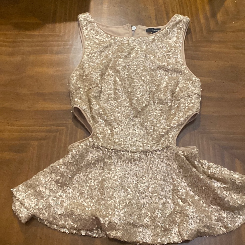 Sequin cut out peplum top